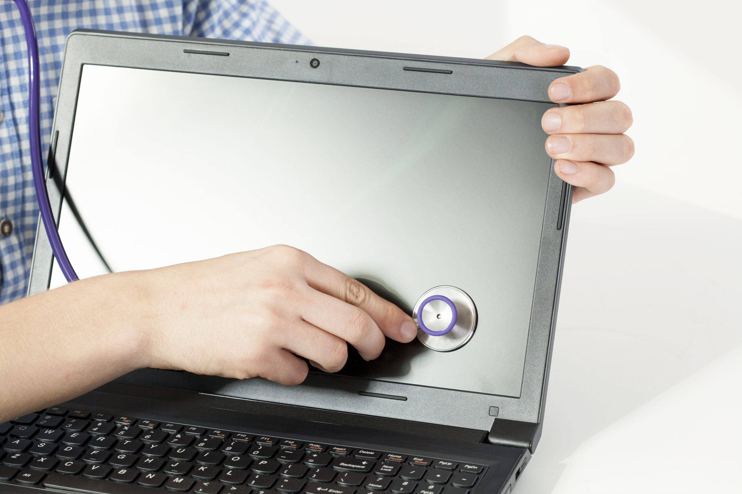 Close-up of medical stethoscope on the screen and why may need rugged computers as cure