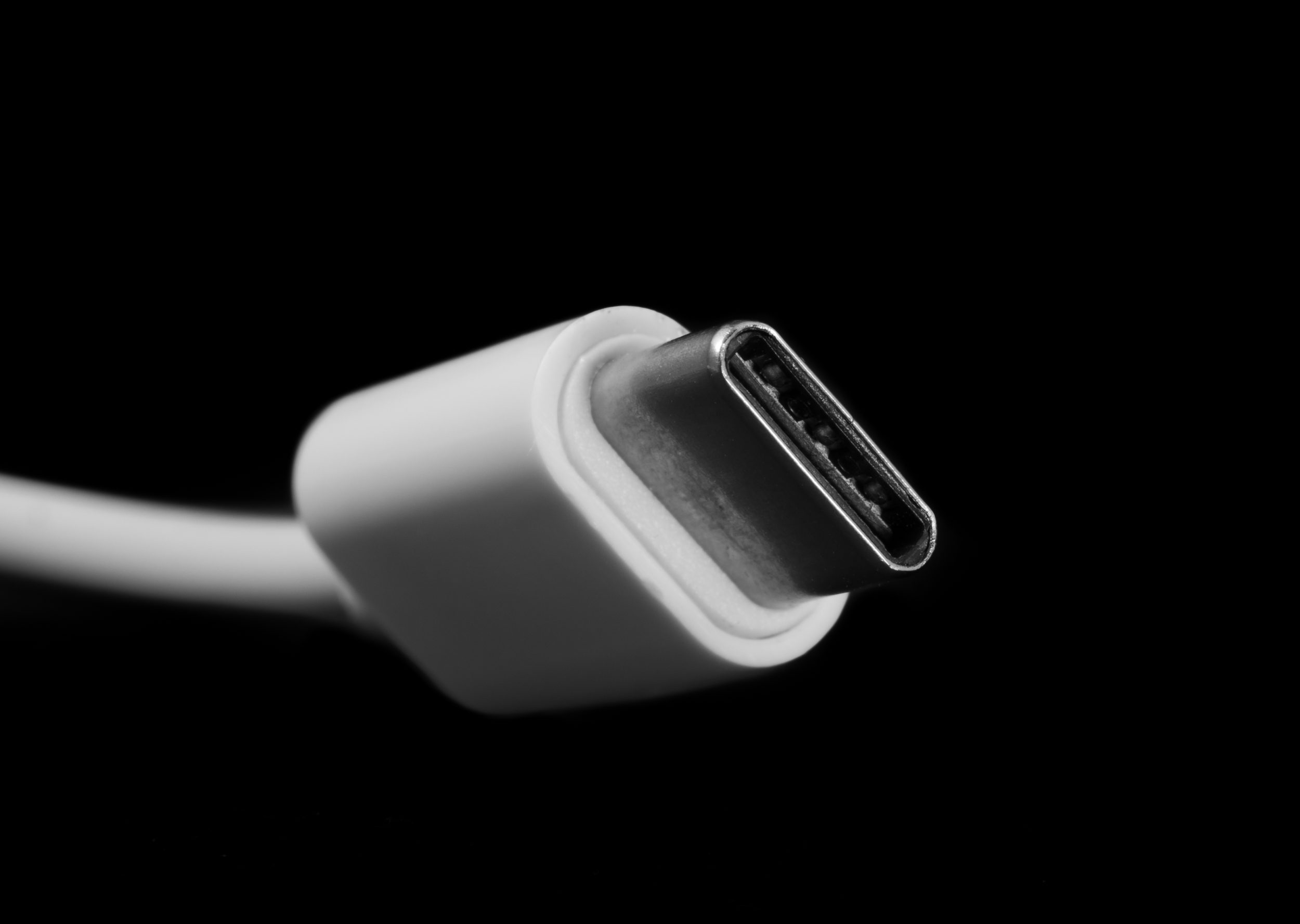 Micro USB type C or USB-C plug and white cable close-up for medical computer