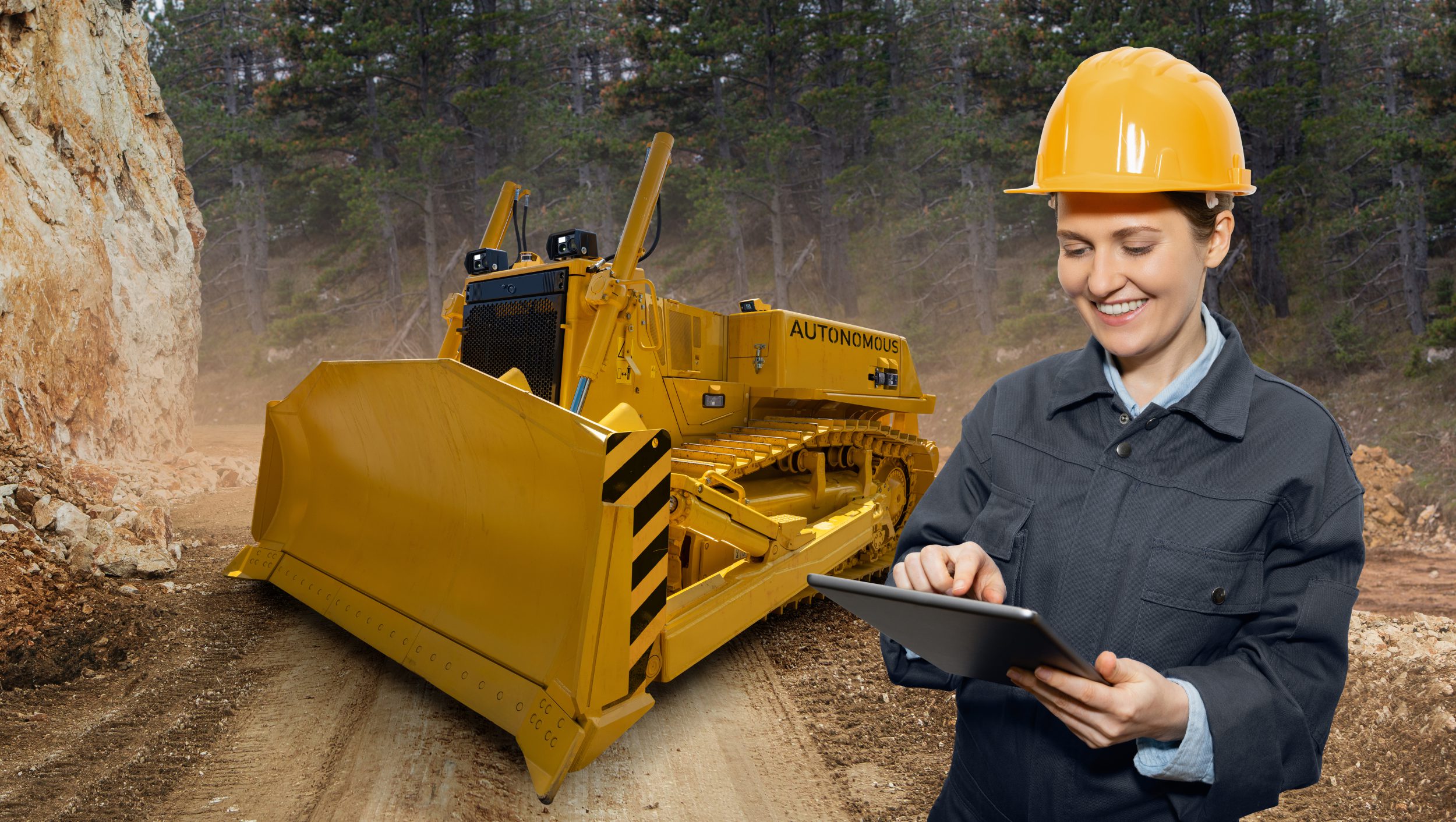 mining safety technology as Engineer programs autonomous bulldozer using digital tablet