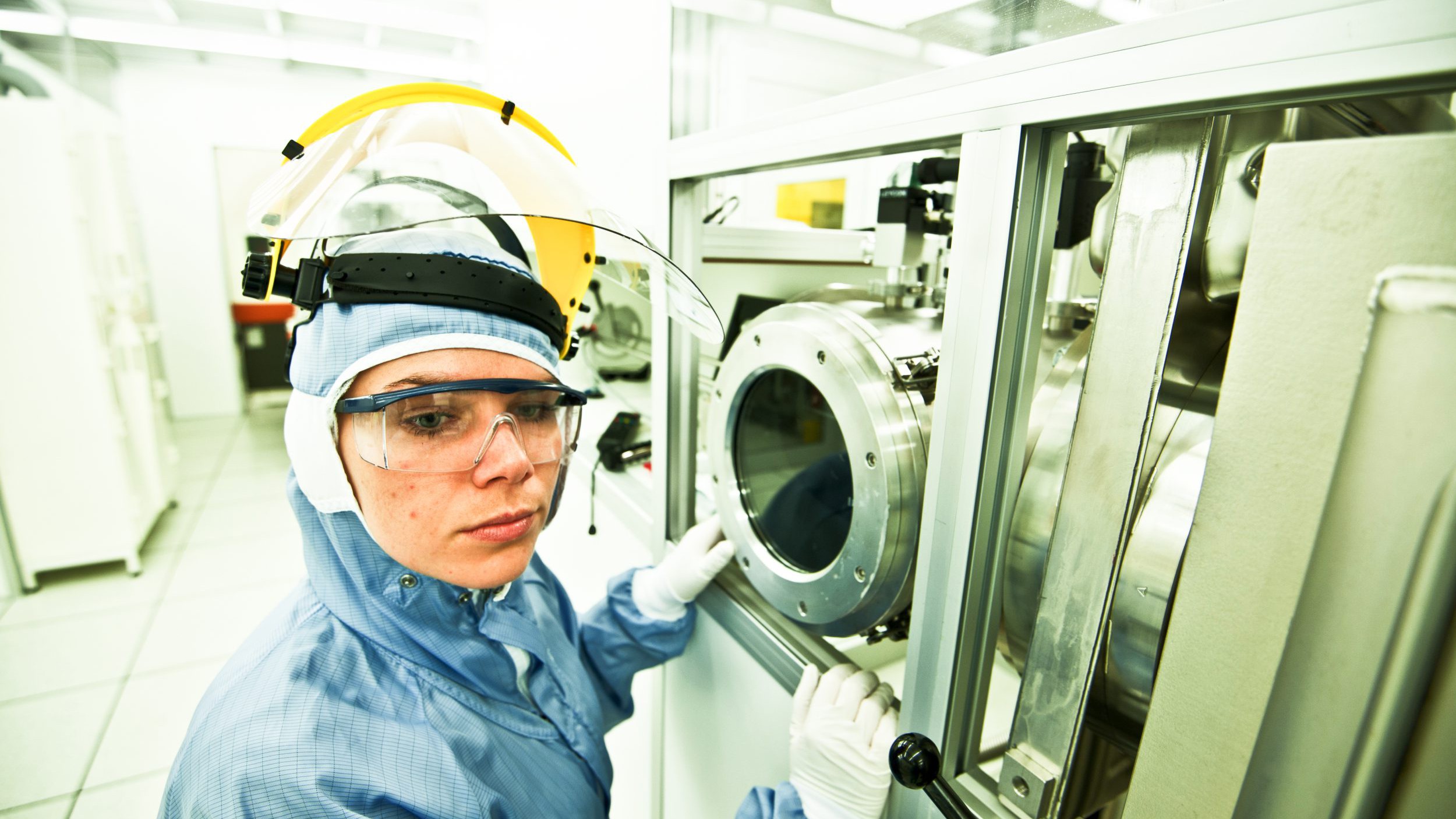 medical device regulation being tested by Woman Scientist Pose in Cleanroom/Laboratory