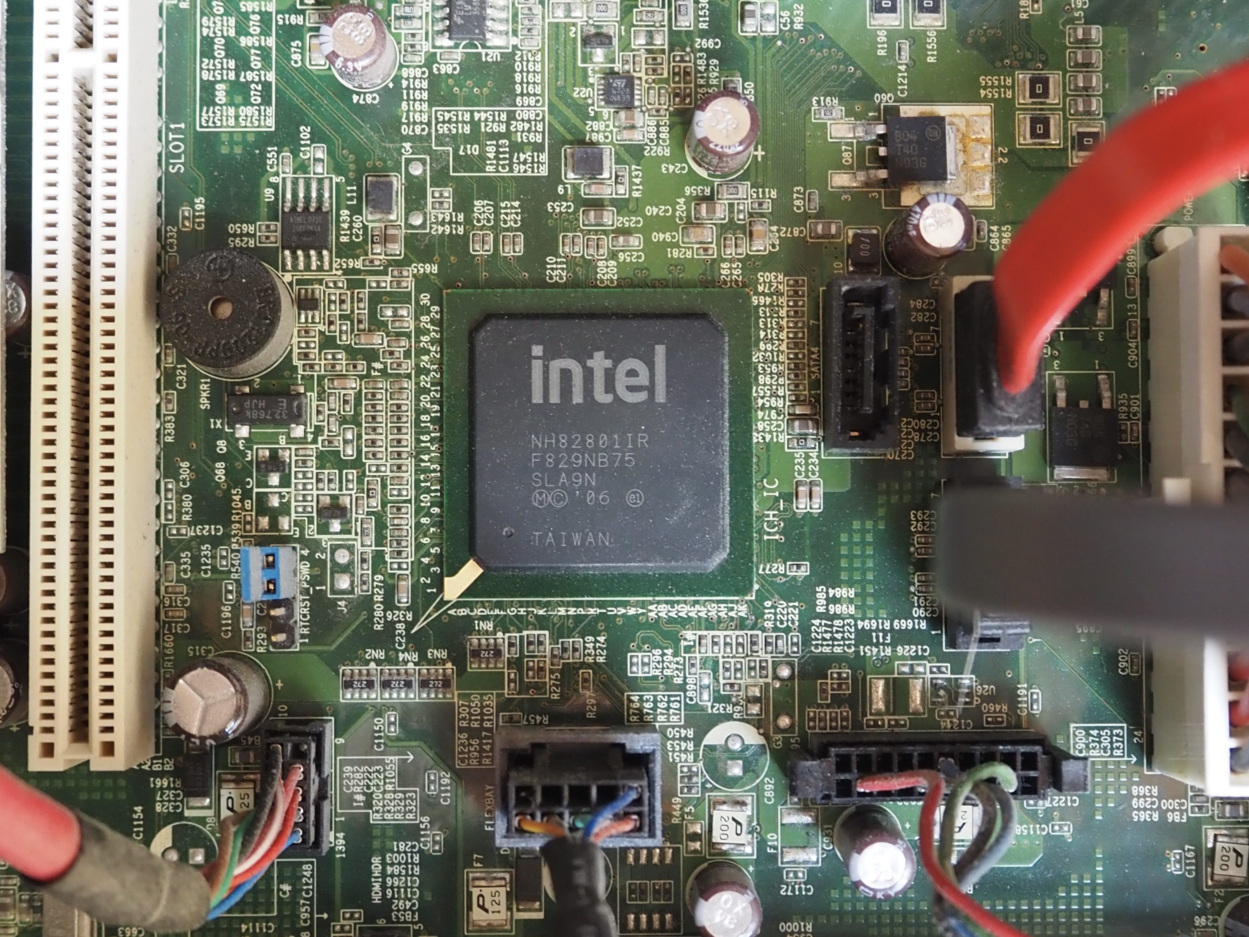 Possible Intel AI silicon CPU Taiwanese microprocessor chip at the center of a motherboard circuitboard.