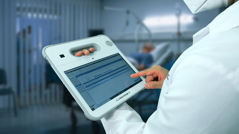 Rugged Medical Tablet Held by Doctor