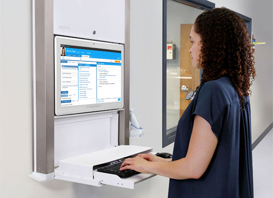 CyberMed S24 Wall Mounted with Nurse Standing Typing